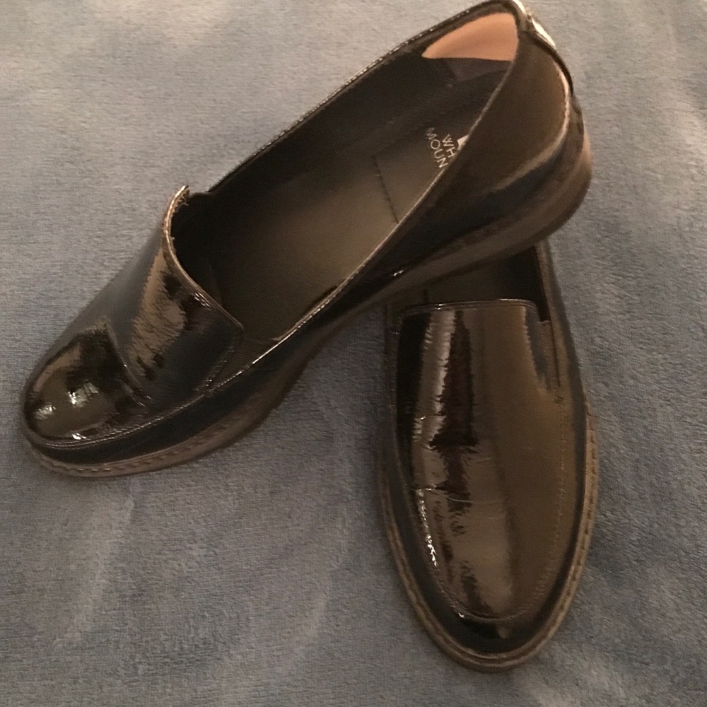 Patent leather slip on loafer.